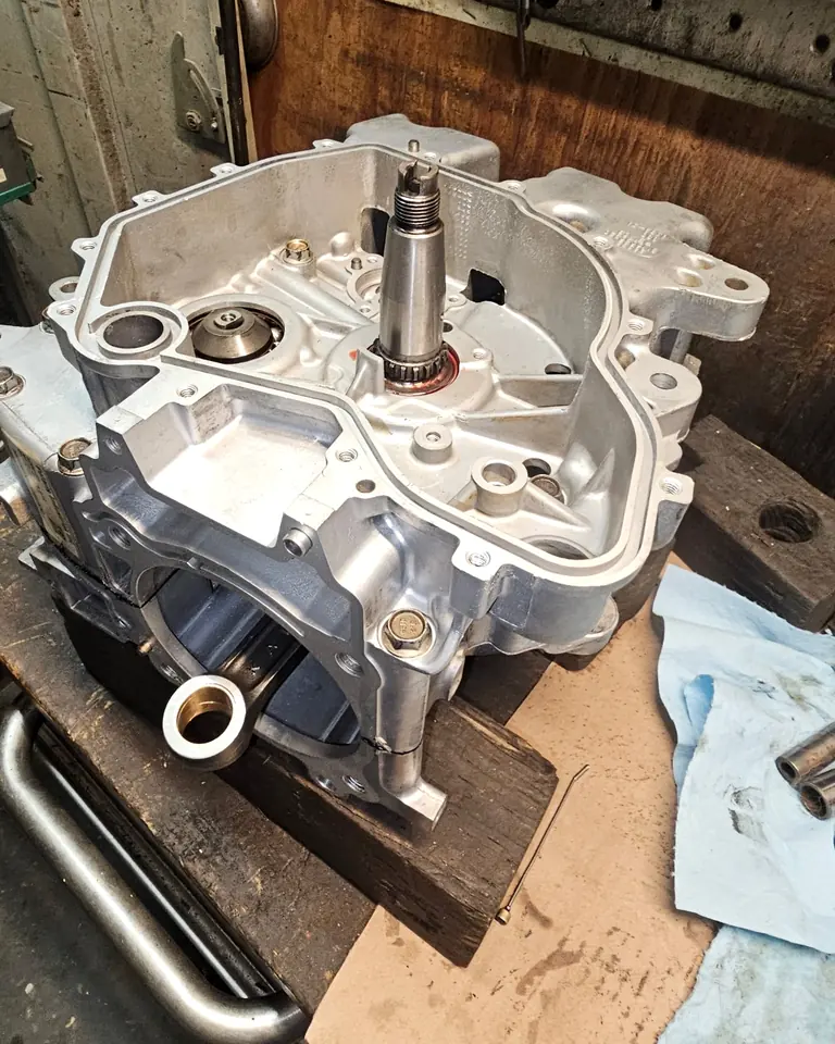 Polaris 570 crankcase during a complete engine rebuild, opened on the bench with the balance shaft fitted