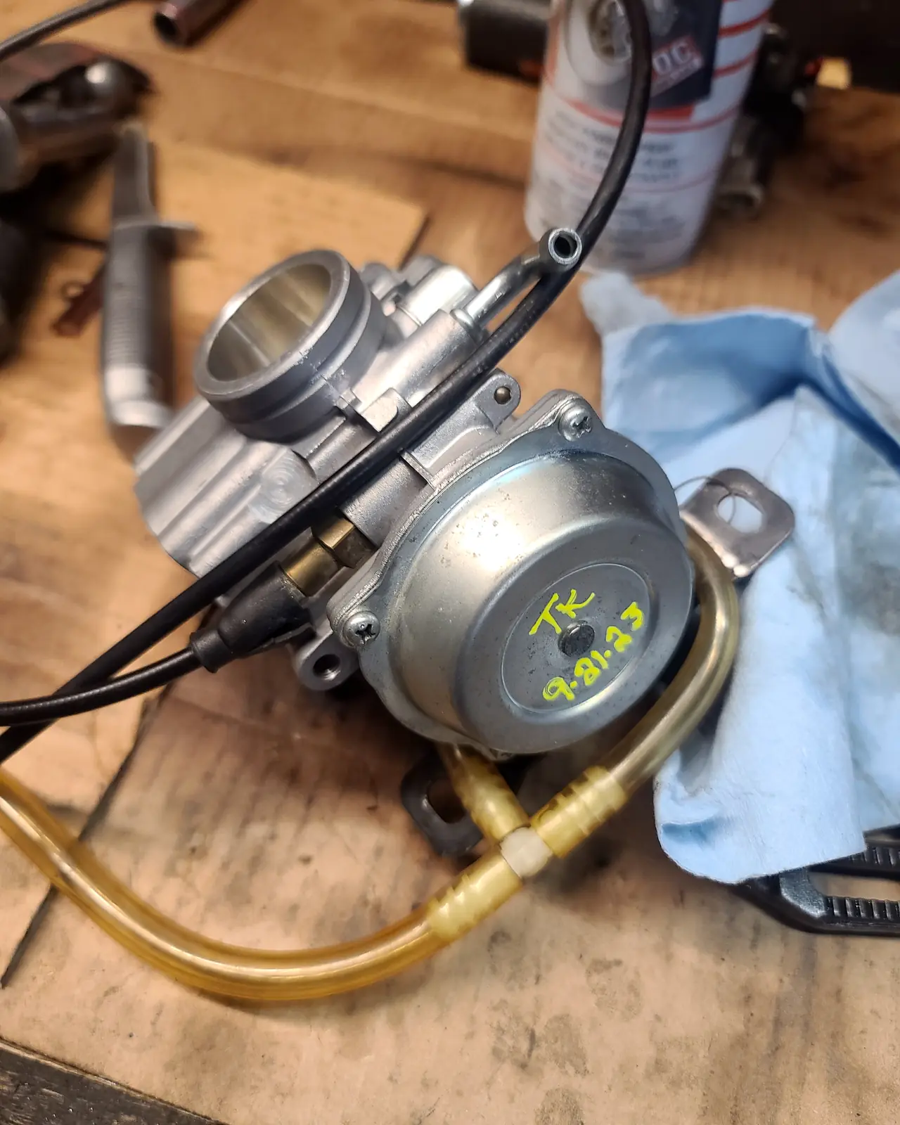 Polaris water pump housing and carburettor assembly marked with a dated paint pen note